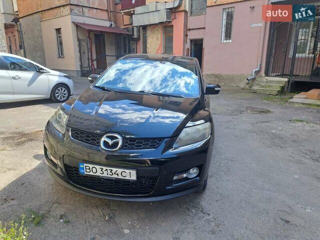 Черный Мазда СХ-7, объемом двигателя 2.3 л и пробегом 103 тыс. км за 6500 $, фото 1 на Automoto.ua