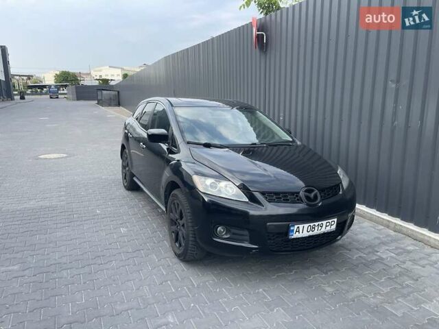 Черный Мазда СХ-7, объемом двигателя 2.26 л и пробегом 246 тыс. км за 6200 $, фото 1 на Automoto.ua