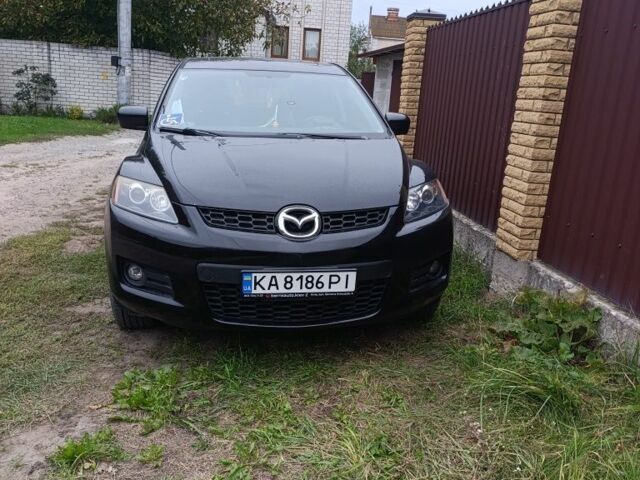Черный Мазда СХ-7, объемом двигателя 2.3 л и пробегом 190 тыс. км за 8000 $, фото 1 на Automoto.ua