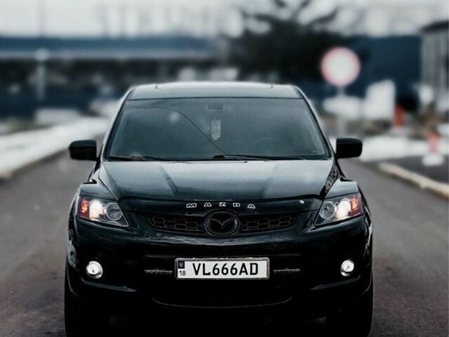 Черный Мазда СХ-7, объемом двигателя 2.3 л и пробегом 145 тыс. км за 7800 $, фото 1 на Automoto.ua