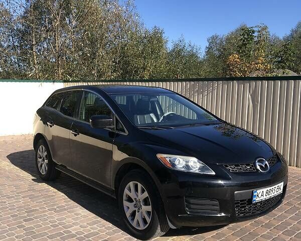 Черный Мазда СХ-7, объемом двигателя 2.3 л и пробегом 247 тыс. км за 5500 $, фото 1 на Automoto.ua