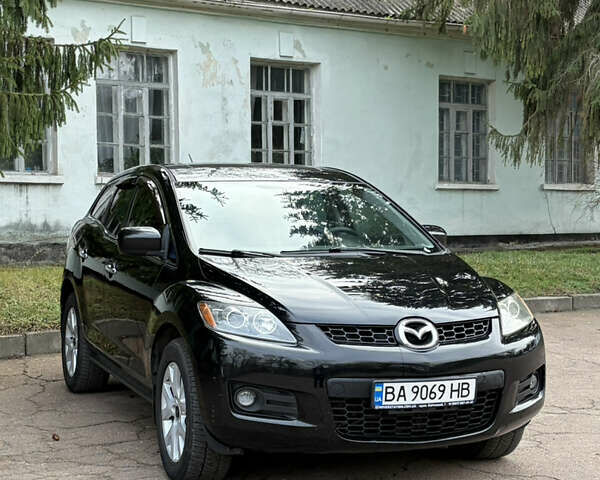 Черный Мазда СХ-7, объемом двигателя 2.3 л и пробегом 106 тыс. км за 8500 $, фото 1 на Automoto.ua