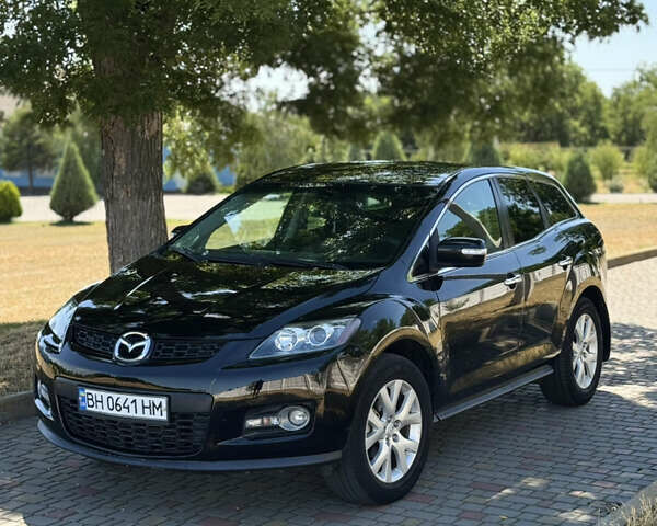 Черный Мазда СХ-7, объемом двигателя 2.3 л и пробегом 143 тыс. км за 6600 $, фото 1 на Automoto.ua