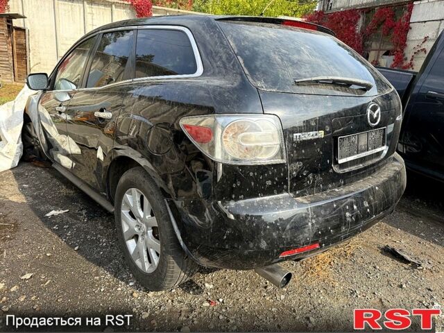 Черный Мазда СХ-7, объемом двигателя 2.3 л и пробегом 150 тыс. км за 2500 $, фото 1 на Automoto.ua