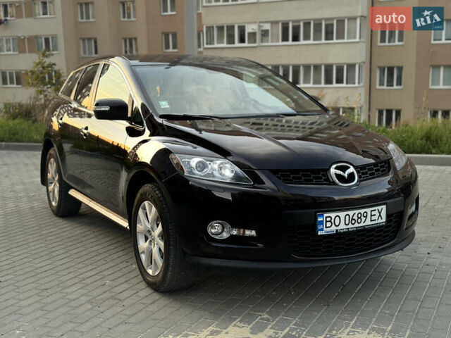 Черный Мазда СХ-7, объемом двигателя 2.26 л и пробегом 83 тыс. км за 7700 $, фото 1 на Automoto.ua