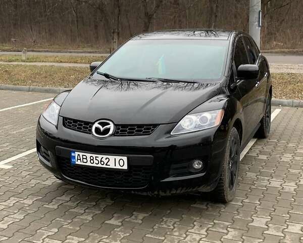Черный Мазда СХ-7, объемом двигателя 2.3 л и пробегом 145 тыс. км за 7900 $, фото 1 на Automoto.ua