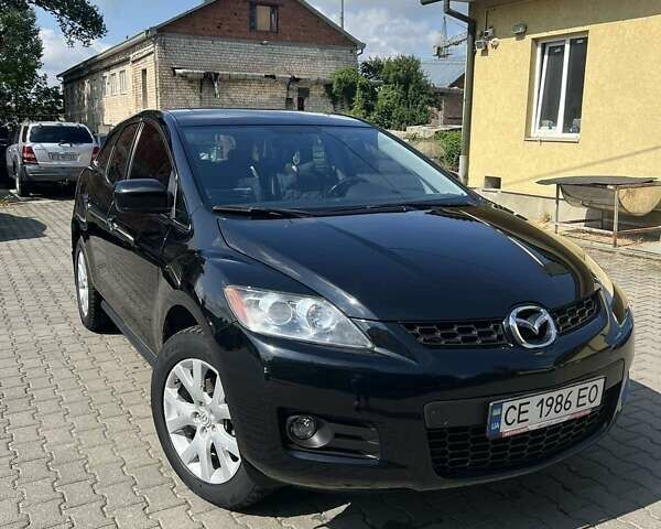 Черный Мазда СХ-7, объемом двигателя 2.25 л и пробегом 60 тыс. км за 8200 $, фото 1 на Automoto.ua