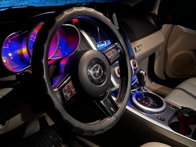 Черный Мазда СХ-7, объемом двигателя 2.3 л и пробегом 153 тыс. км за 7000 $, фото 1 на Automoto.ua