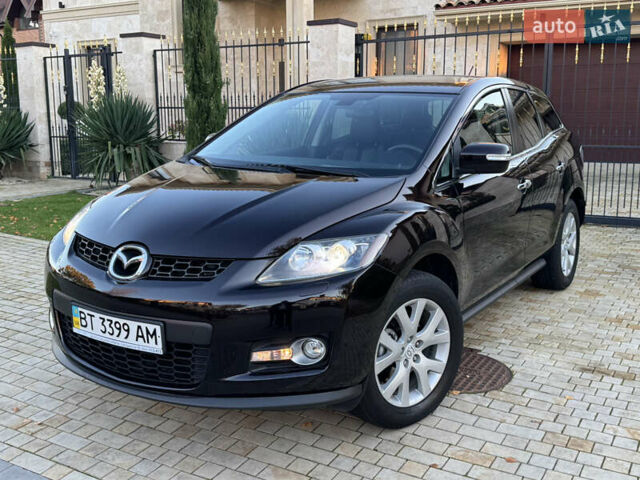 Черный Мазда СХ-7, объемом двигателя 2.3 л и пробегом 124 тыс. км за 7800 $, фото 1 на Automoto.ua