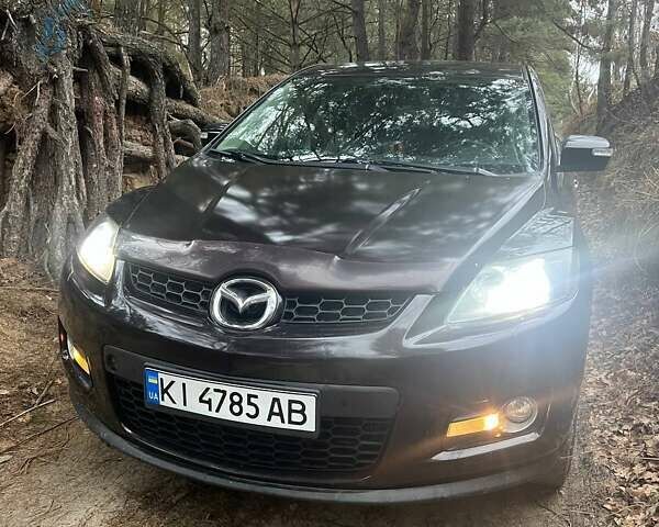 Черный Мазда СХ-7, объемом двигателя 2.26 л и пробегом 153 тыс. км за 9000 $, фото 1 на Automoto.ua