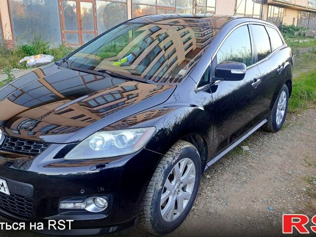 Черный Мазда СХ-7, объемом двигателя 2.3 л и пробегом 250 тыс. км за 7500 $, фото 1 на Automoto.ua