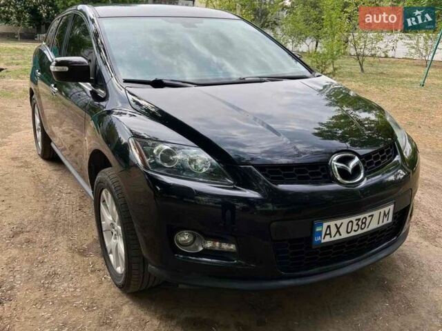 Черный Мазда СХ-7, объемом двигателя 2.26 л и пробегом 130 тыс. км за 7500 $, фото 1 на Automoto.ua