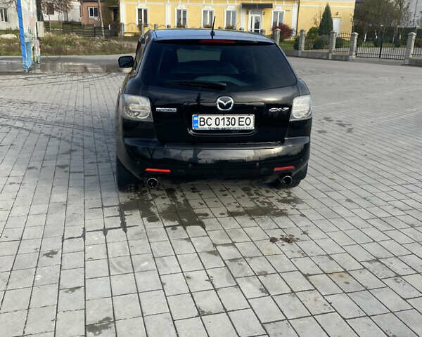 Черный Мазда СХ-7, объемом двигателя 2.3 л и пробегом 80 тыс. км за 7500 $, фото 1 на Automoto.ua