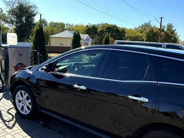 Черный Мазда СХ-7, объемом двигателя 2.3 л и пробегом 288 тыс. км за 8500 $, фото 1 на Automoto.ua