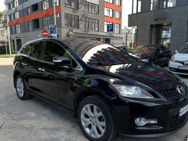 Черный Мазда СХ-7, объемом двигателя 2.3 л и пробегом 195 тыс. км за 5800 $, фото 1 на Automoto.ua