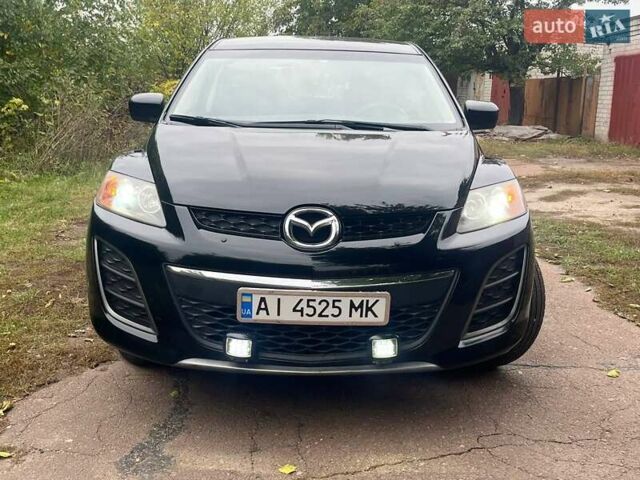 Черный Мазда СХ-7, объемом двигателя 2.49 л и пробегом 260 тыс. км за 9000 $, фото 1 на Automoto.ua