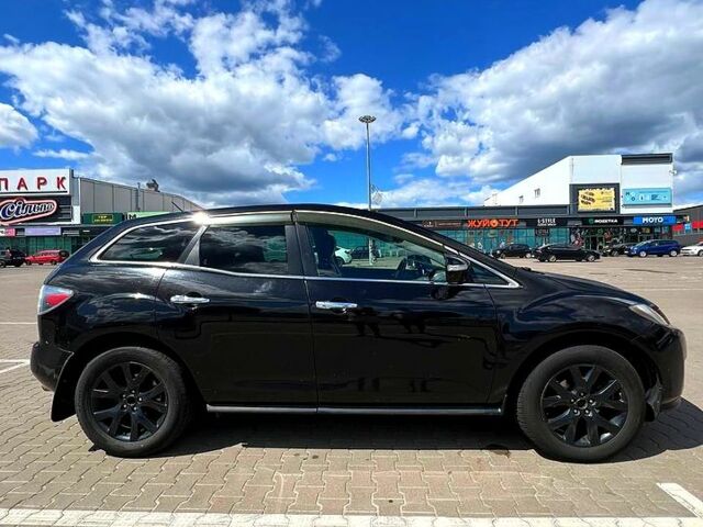 Черный Мазда СХ-7, объемом двигателя 2.3 л и пробегом 157 тыс. км за 6700 $, фото 1 на Automoto.ua