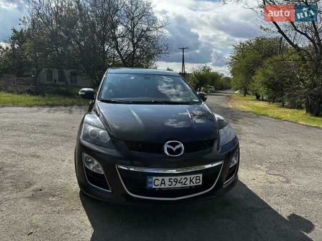 Черный Мазда СХ-7, объемом двигателя 2.2 л и пробегом 221 тыс. км за 11000 $, фото 1 на Automoto.ua