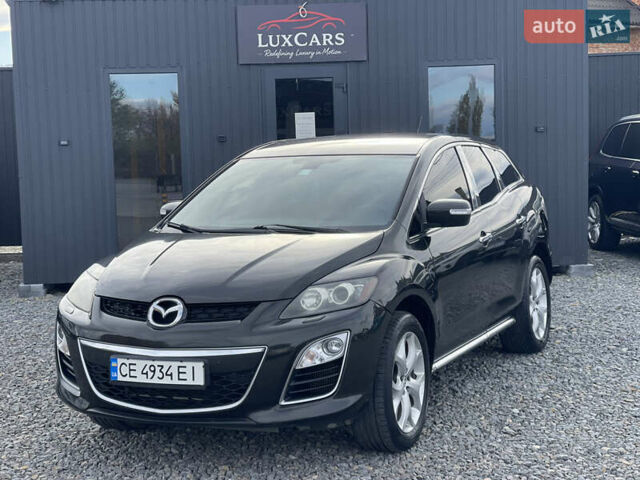 Черный Мазда СХ-7, объемом двигателя 2.18 л и пробегом 302 тыс. км за 8750 $, фото 1 на Automoto.ua