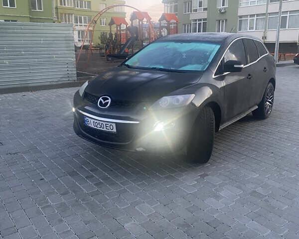 Черный Мазда СХ-7, объемом двигателя 2.5 л и пробегом 186 тыс. км за 10800 $, фото 1 на Automoto.ua