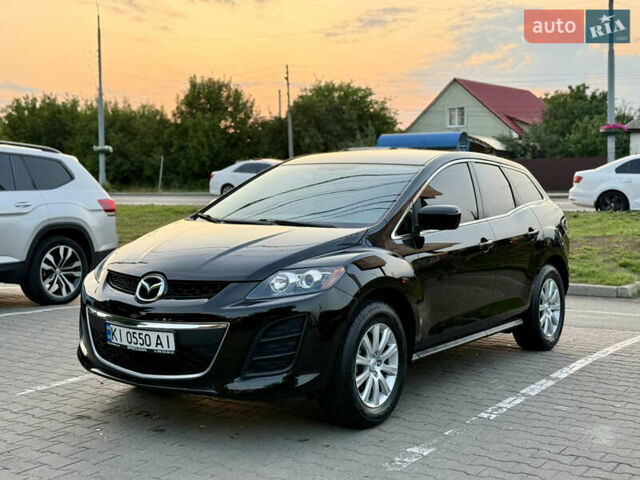 Черный Мазда СХ-7, объемом двигателя 2.5 л и пробегом 102 тыс. км за 10800 $, фото 1 на Automoto.ua