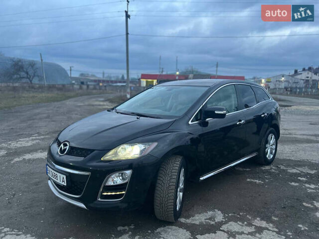 Черный Мазда СХ-7, объемом двигателя 2.2 л и пробегом 245 тыс. км за 10200 $, фото 1 на Automoto.ua