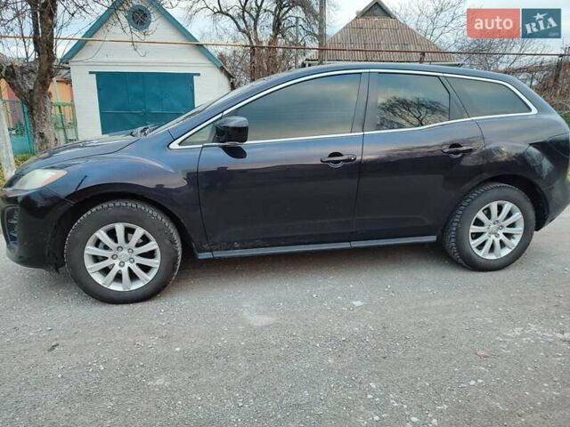 Черный Мазда СХ-7, объемом двигателя 2.5 л и пробегом 271 тыс. км за 11000 $, фото 1 на Automoto.ua