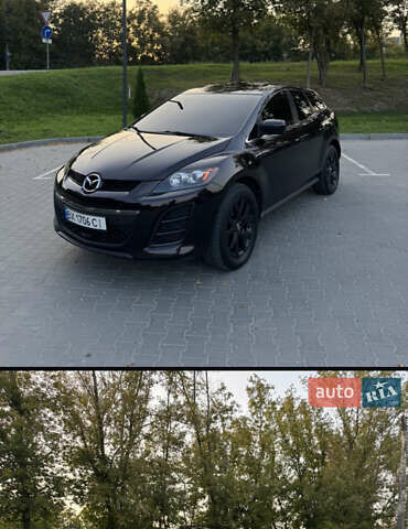 Фиолетовый Мазда СХ-7, объемом двигателя 2.5 л и пробегом 160 тыс. км за 12000 $, фото 1 на Automoto.ua