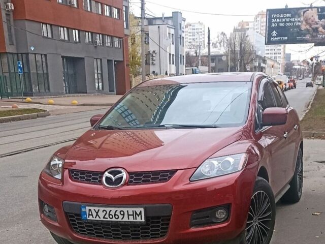 Красный Мазда СХ-7, объемом двигателя 2.3 л и пробегом 145 тыс. км за 6999 $, фото 1 на Automoto.ua