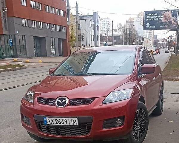 Красный Мазда СХ-7, объемом двигателя 2.3 л и пробегом 145 тыс. км за 6700 $, фото 1 на Automoto.ua