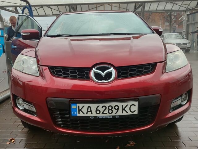Красный Мазда СХ-7, объемом двигателя 2.3 л и пробегом 203 тыс. км за 5499 $, фото 1 на Automoto.ua