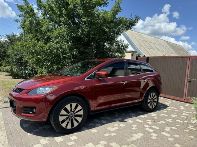 Красный Мазда СХ-7, объемом двигателя 2.3 л и пробегом 127 тыс. км за 7400 $, фото 1 на Automoto.ua