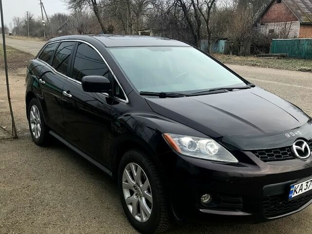 Красный Мазда СХ-7, объемом двигателя 2.3 л и пробегом 87 тыс. км за 7999 $, фото 1 на Automoto.ua