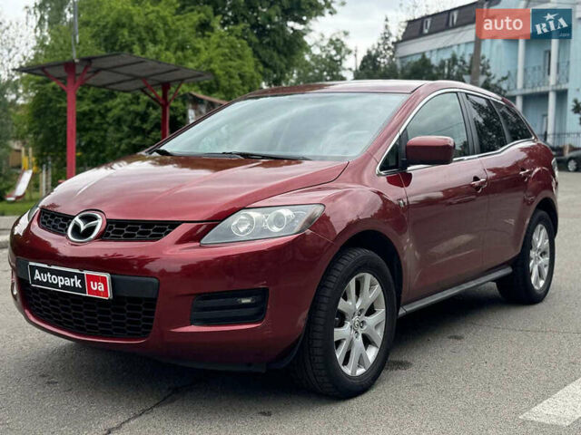 Красный Мазда СХ-7, объемом двигателя 2.3 л и пробегом 210 тыс. км за 6890 $, фото 1 на Automoto.ua