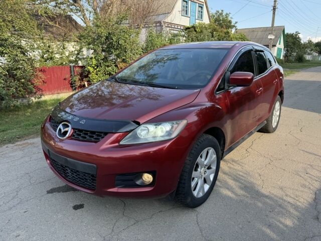 Красный Мазда СХ-7, объемом двигателя 2.3 л и пробегом 147 тыс. км за 3800 $, фото 1 на Automoto.ua