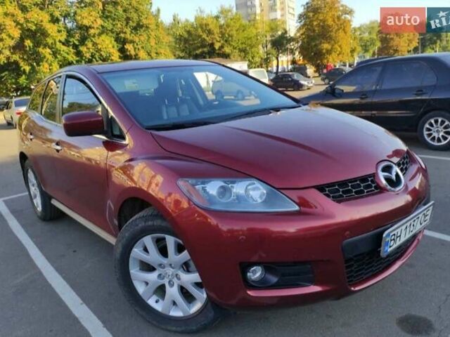 Красный Мазда СХ-7, объемом двигателя 2.3 л и пробегом 300 тыс. км за 7000 $, фото 1 на Automoto.ua