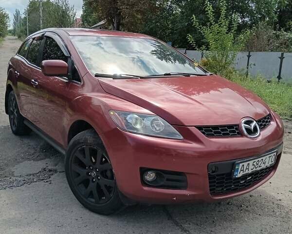 Красный Мазда СХ-7, объемом двигателя 2.26 л и пробегом 196 тыс. км за 7100 $, фото 1 на Automoto.ua