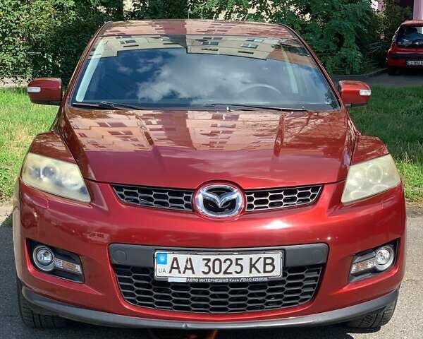 Красный Мазда СХ-7, объемом двигателя 2.3 л и пробегом 169 тыс. км за 5700 $, фото 1 на Automoto.ua