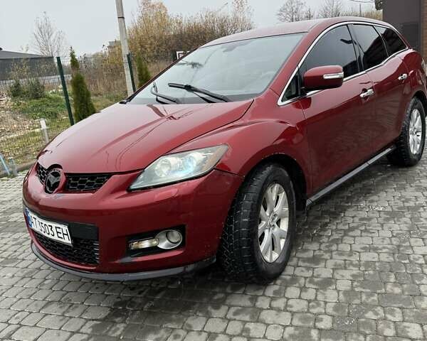 Красный Мазда СХ-7, объемом двигателя 2.3 л и пробегом 210 тыс. км за 4000 $, фото 1 на Automoto.ua