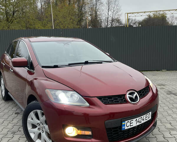 Красный Мазда СХ-7, объемом двигателя 2.26 л и пробегом 100 тыс. км за 5950 $, фото 1 на Automoto.ua
