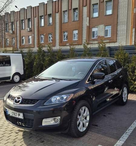 Красный Мазда СХ-7, объемом двигателя 2.3 л и пробегом 171 тыс. км за 6300 $, фото 1 на Automoto.ua