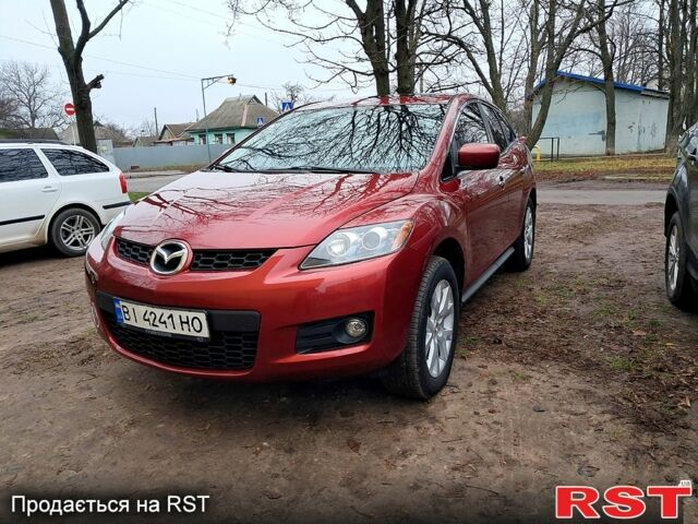 Красный Мазда СХ-7, объемом двигателя 2.3 л и пробегом 157 тыс. км за 6600 $, фото 1 на Automoto.ua