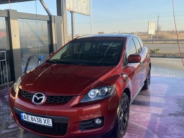 Красный Мазда СХ-7, объемом двигателя 2.3 л и пробегом 255 тыс. км за 6600 $, фото 1 на Automoto.ua