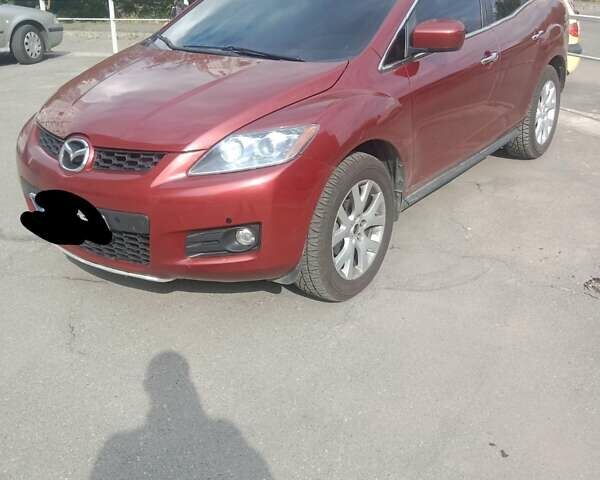 Красный Мазда СХ-7, объемом двигателя 2.3 л и пробегом 141 тыс. км за 6300 $, фото 1 на Automoto.ua