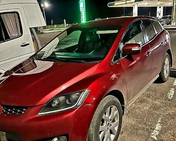 Красный Мазда СХ-7, объемом двигателя 2.3 л и пробегом 240 тыс. км за 7500 $, фото 1 на Automoto.ua