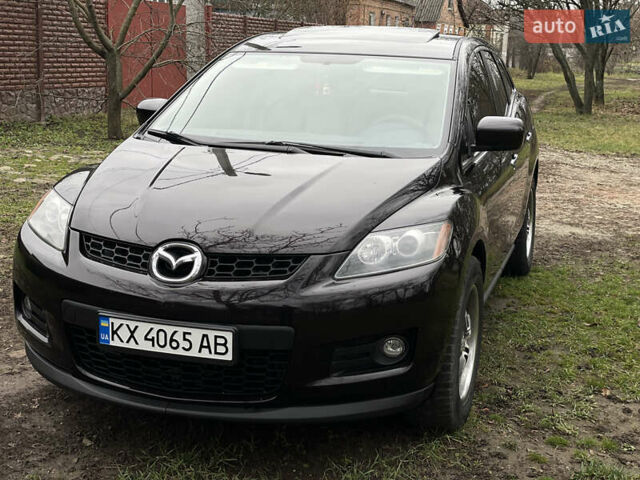 Красный Мазда СХ-7, объемом двигателя 2.3 л и пробегом 113 тыс. км за 7500 $, фото 1 на Automoto.ua