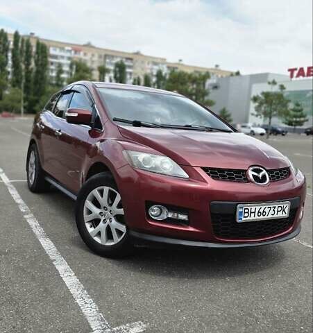 Красный Мазда СХ-7, объемом двигателя 2.26 л и пробегом 171 тыс. км за 7400 $, фото 1 на Automoto.ua