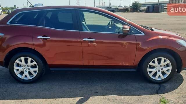 Червоний Мазда СХ-7, об'ємом двигуна 2.3 л та пробігом 123 тис. км за 7000 $, фото 1 на Automoto.ua