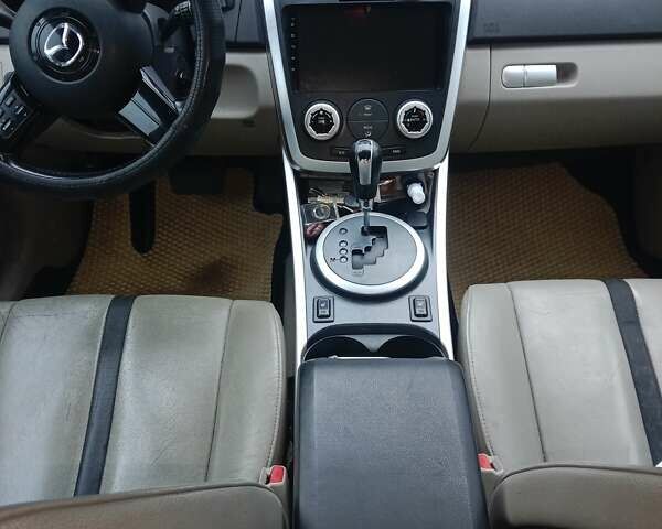 Красный Мазда СХ-7, объемом двигателя 2.26 л и пробегом 190 тыс. км за 6800 $, фото 1 на Automoto.ua