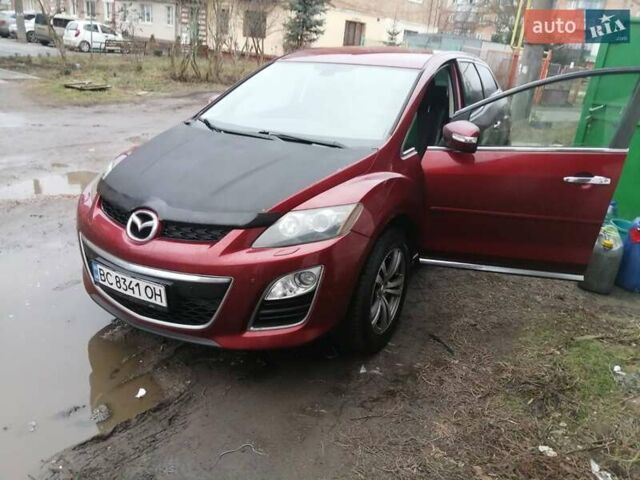 Красный Мазда СХ-7, объемом двигателя 2.2 л и пробегом 254 тыс. км за 7900 $, фото 1 на Automoto.ua